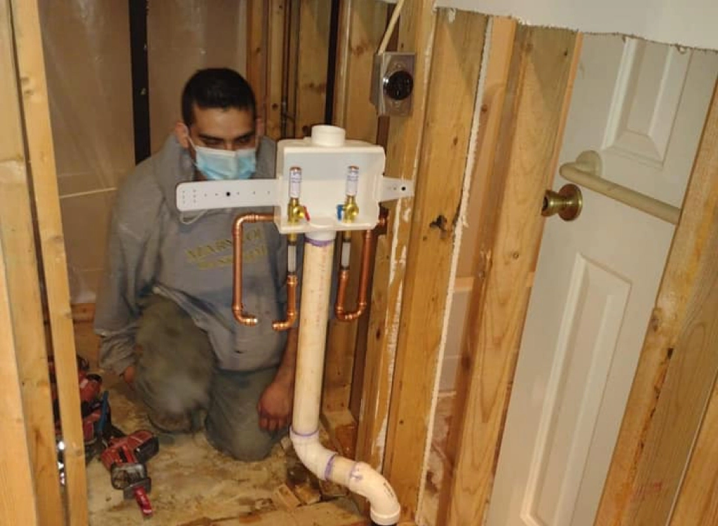 plumber doing an installation